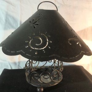 Candle holder with design decorations shade